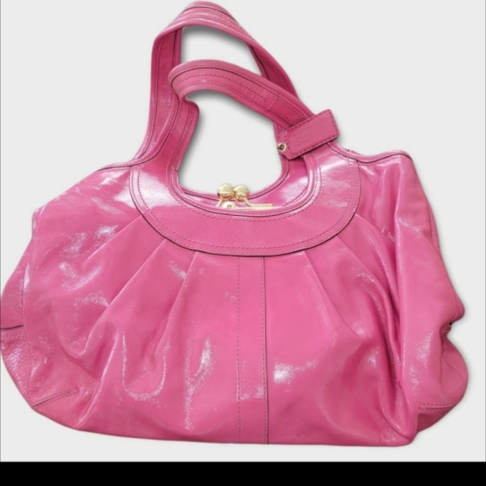 Coach Bright Pink Leather Purse, beautiful Flawless outside, small stain on the